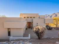 CUSTOM HILLTOP HOME WITH BREATHTAKING VIEWS