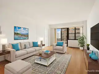 Sun-Drenched High-Floor Convertible in Full-Service Condo