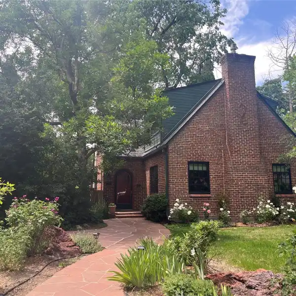 CHARMING TUDOR HOME SITUATED ON A PICTURESQUE HILLTOP STREET