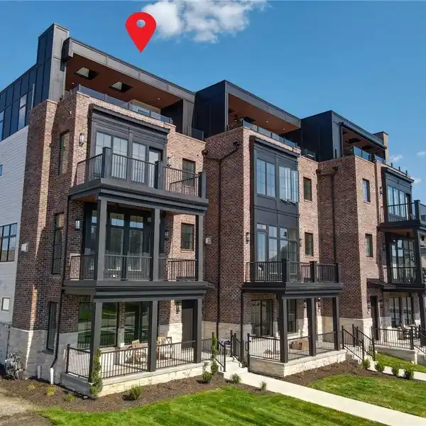 DISTINCTIVE BROWNSTONE AT THE RIVER'S EDGE
