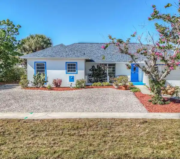 CHARMING CANAL-FRONT HOME WITH BREATHTAKING VIEWS