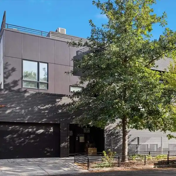 BEAUTIFULLY MODERN AND ARCHITECTURALLY UNIQUE HOME