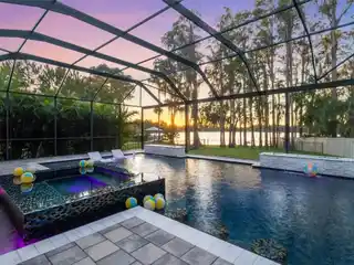 Lakefront Luxury with Resort-Style Pool and Sunset Views