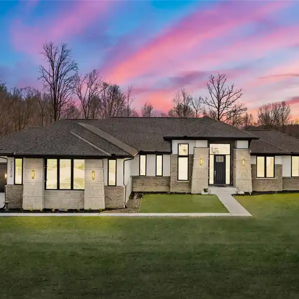 ARCHITECT-DESIGNED HOME ON FENCED ACREAGE