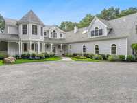 BEAUTIFULLY RENOVATED TRADITIONAL HOME ON NEARLY FOUR ACRES