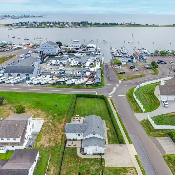 REBUILT BEAUTY STEPS FROM THE SHORELINE