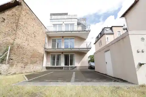 Centrally Located Three-Family House with Large Roof Terrace