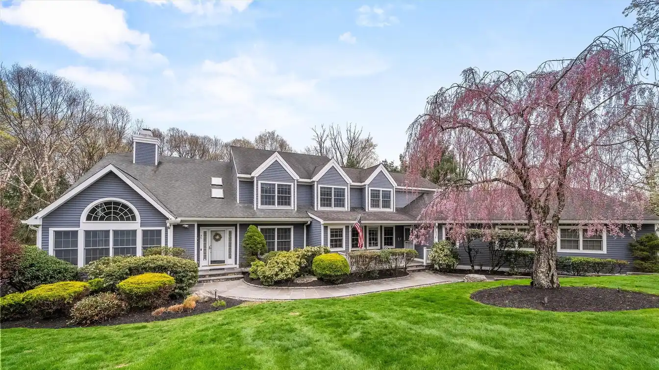 Impeccable Colonial Nestled on Almost 2 Private Acres