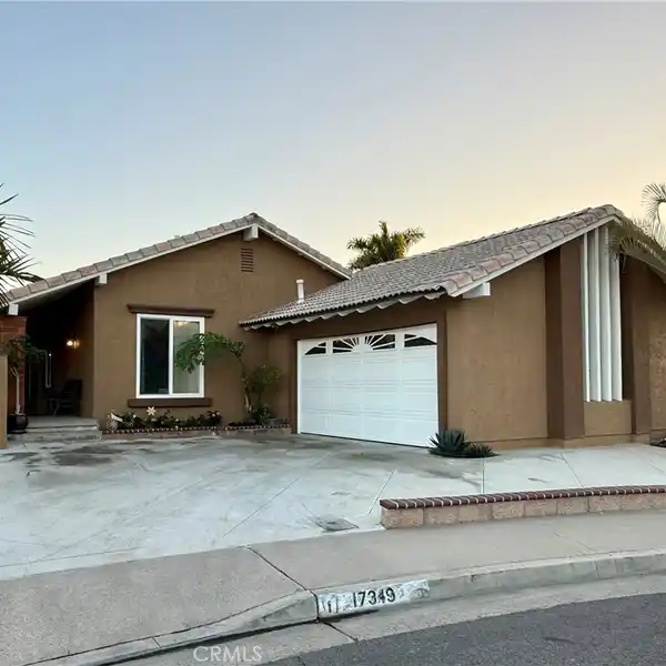 SOLAR-POWERED HOME WITH PRIVATE BACKYARD OASIS