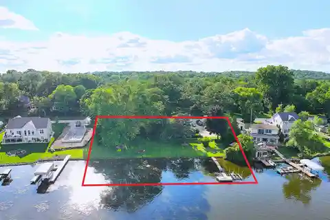 Rare Riverfront Estate with 200’ Frontage