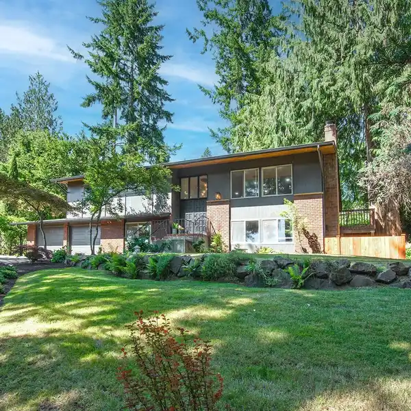 STUNNING SPLIT-LEVEL ON A PARK-LIKE LOT