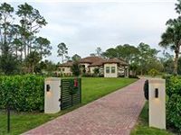 UPGRADED HOME ON MORE THAN THREE GATED ACRES