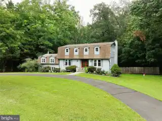 Elegant Dining and Living Areas with Hardwood Floors