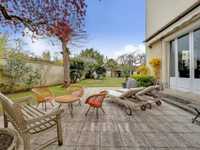 SPACIOUS HOME ON BEAUTIFUL GROUNDS IN IDEAL QUIET LOCATION