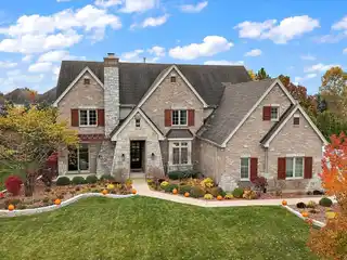 Impressive Brick Home with Luxe Indoor-Outdoor Living