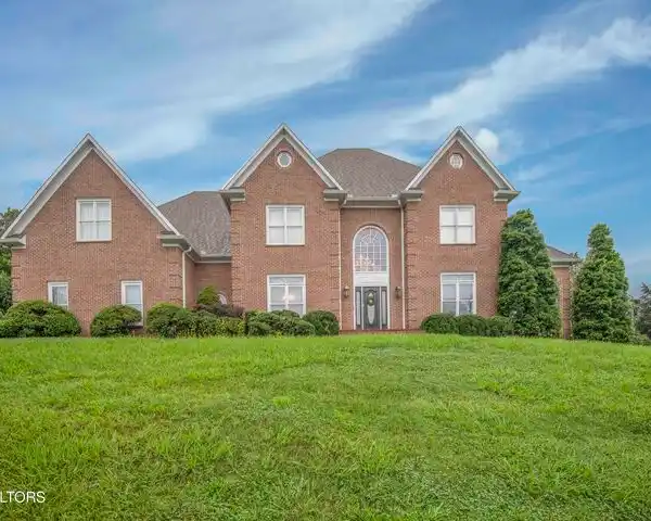 STATELY ALL-BRICK HOME ON A PROMINENT CORNER