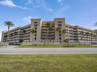 Turnkey Beachfront Condo Near Pristine Shores