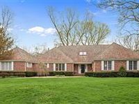 METICULOUSLY MAINTAINED BRICK HOME WITH GOLF VIEWS