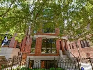 Exquisite Brick Duplex with Sophisticated Entertaining Spaces