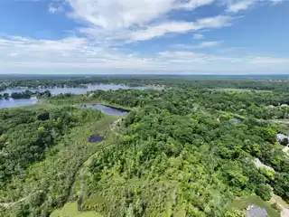 13.5-Acre Wooded Sanctuary on Commerce Lake