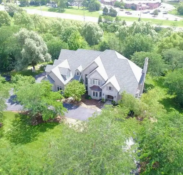 EXCEPTIONAL CUSTOM-BUILT HOME IN PRESTIGIOUS WHITE BIRCH LAKES