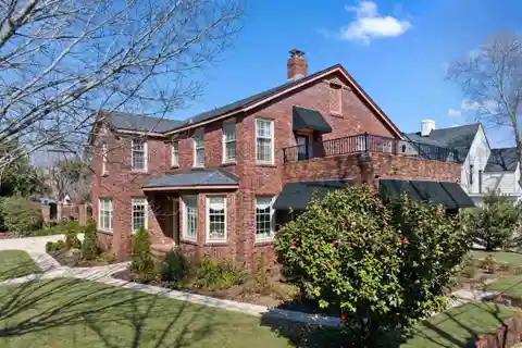 Tudor-style Brick Pool Home in Historic East Hill