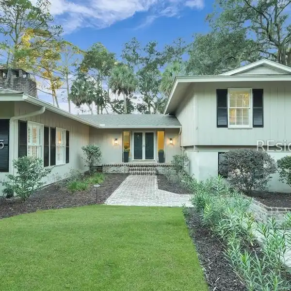 RENOVATED COASTAL RESIDENCE WITH SUN-FILLED OPEN LAYOUT