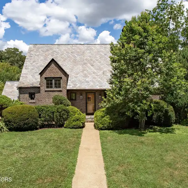 THOUGHTFULLY RENOVATED ENGLISH TUDOR-STYLE HOME