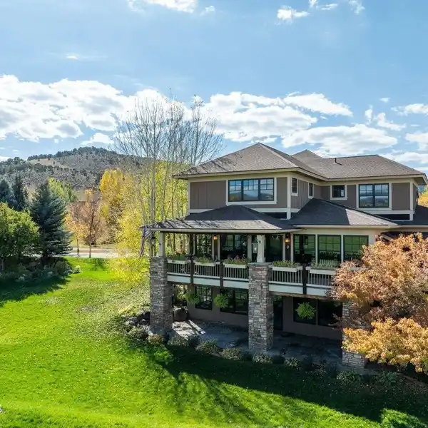ONE-OF-A-KIND LUXURY HOME IN THE POPULAR EAGLE RANCH ENCLAVE