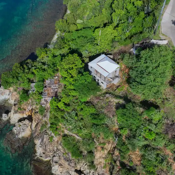A WATERFRONT OASIS WITH HUGE POTENTIAL