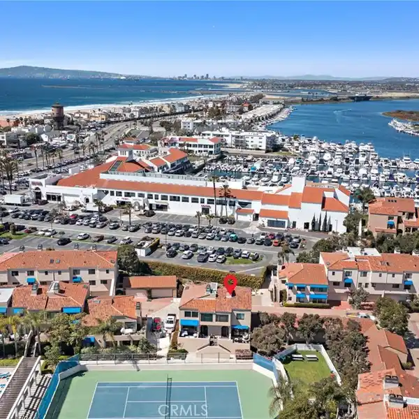 FINE CONDOMINIUM IN A SOUGHT-AFTER GUARD GATED ENCLAVE
