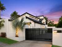 IMPECCABLY RENOVATED BRIGHT AND BREEZY HOME