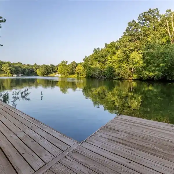 PARK-LIKE SECLUDED LAKE-FRONT LIVING