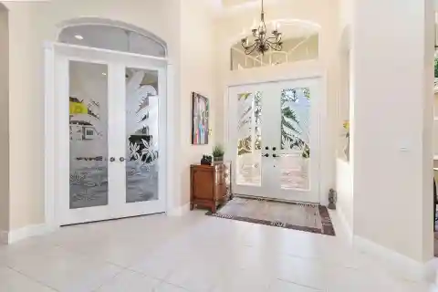 Custom Home on a Lush Private Acre in Bay Hill Estates