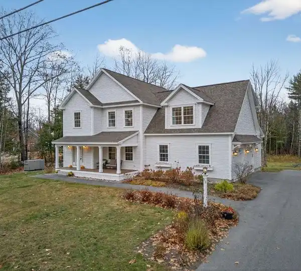 LIGHT-FILLED HOME WITH ELEGANT DESIGN AND OUTDOOR CHARM