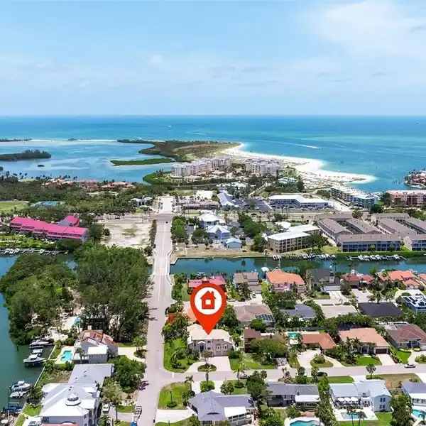 ISLAND LIVING ON AN OVERSIZED CORNER LOT