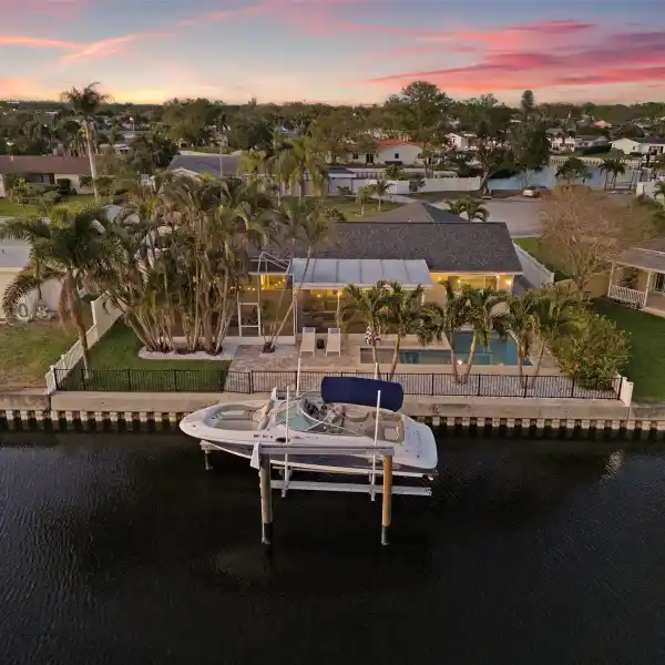 CHARMING WATERFRONT POOL HOME IN WATERWAY ESTATES