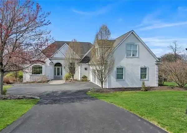 BEAUTIFULLY APPOINTED HOME ON OVER THREE ACRES