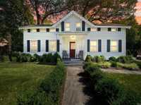 UPDATED VINTAGE COLONIAL NESTLED ON ALMOST TWO ACRES
