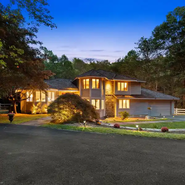 MODERN COLONIAL WITH POOL, BALCONY, AND BROOK VIEWS