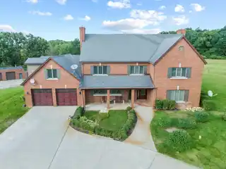 All-brick Home on over 50 Acres