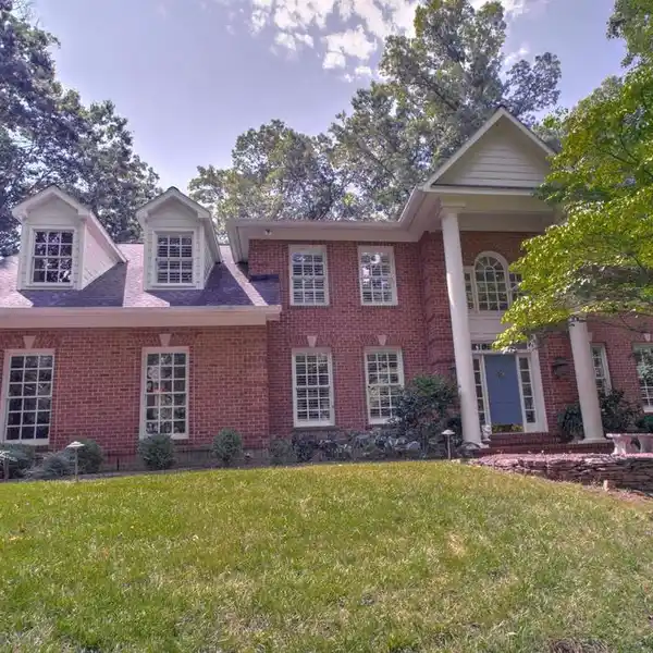 IMPECCABLY UPDATED BRICK HOME WITH OUTDOOR KITCHEN