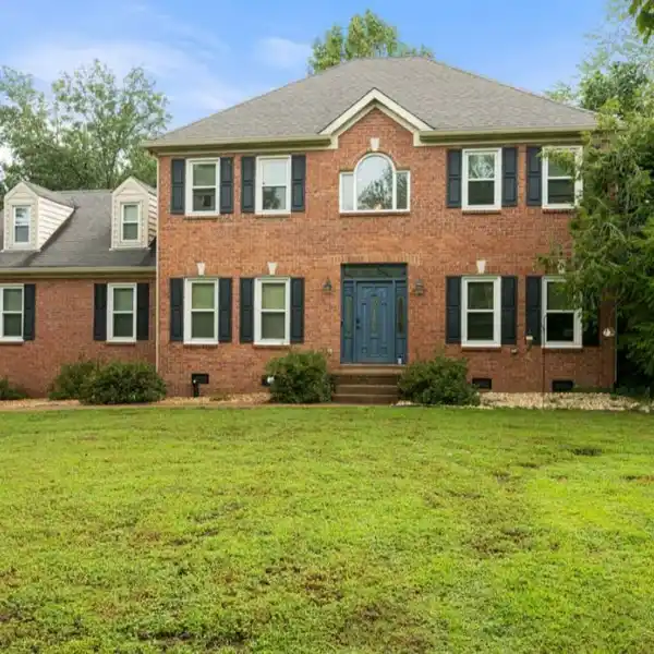BRICK HOME IN A GORGEOUS SETTING