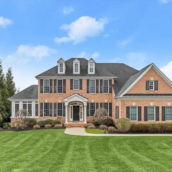 EXQUISITE BRICK COLONIAL IN CLOVERFIELD