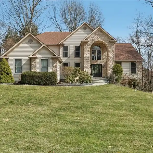 COMFORT AND ELEGANCE ON 2.26 WOODED ACRES