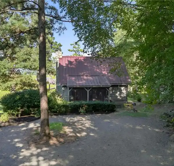 RUSTIC CHARM MEETS MODERN COMFORT ON WATERFRONT