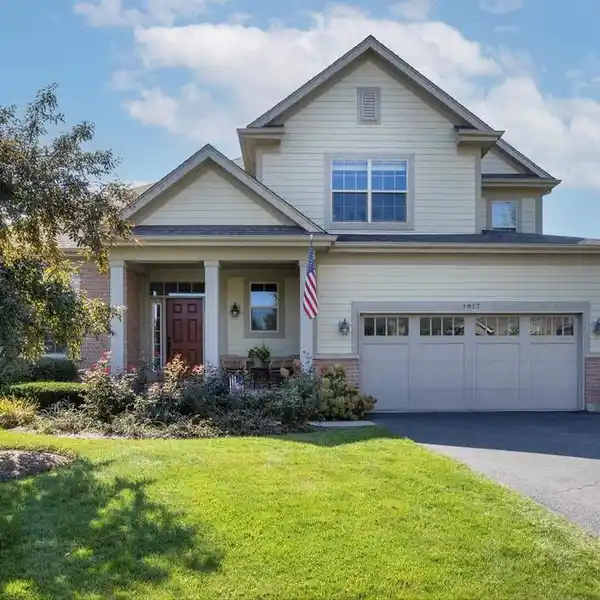 SUN-FILLED INTERIORS WITH HARDWOOD FLOORS THROUGHOUT