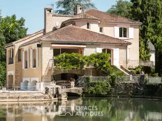 Exceptional Riverside Property with Multiple Guest Homes