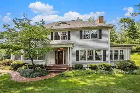 Secluded Estate Surrounded by Manicured Gardens