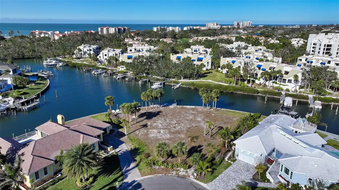 Oversized Waterfront Lot in Exclusive Bay Isles Harbor